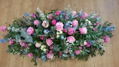 Wild natural casket spray - A traditional large arrangement suitable for a lady or gentleman to sit on top of the casket. Please specify if you would like us to use a particular colour or incorporate specific flowers.