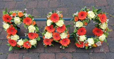 Loose letters - Any letters loosely arranged letters with flowers and foliage of your choice of colour to represent your loved one.