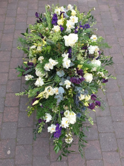 Purple and Cream Casket Spray - Large deep purple and cream seasonal flower casket spray around 5-6ft