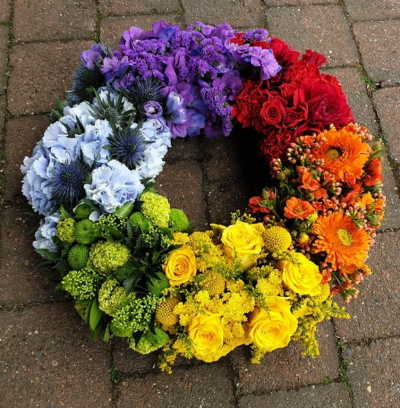 Rainbow Wreath - Wreath in mixed flowers in rainbow colours.