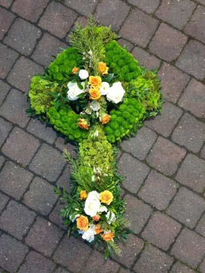 Celtic Cross - Cross tribute in green and mossed with a spray of flowers in the colours of your choice.
