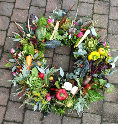 Alotment tribute - A wreath or spray to include vegetables or other favourite plants grown on the alotment.  A tribute fit for the green fingered.  These can also be made completely biodegradable with mossed backing and string with no floral foam products.