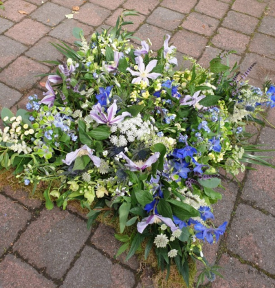 Natural cushion/pillow - Flowers, foliage, mosses and grasses personal to the family and a particular place.
