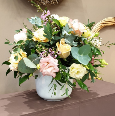 Classic Arrangement with roses - Classic round arrangement in a florist choice pot.