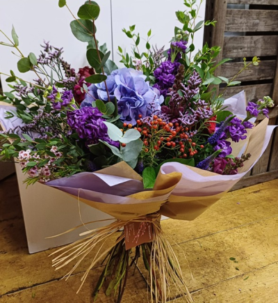 Hydrangea Love - Unstrucutured bouquet to include a focal hydrangea in seasonal colours which may change daily, complimentary flowers and foliage in a scrambled style.